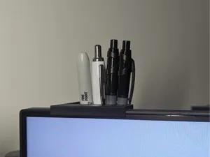 Monitor mounted ped holder