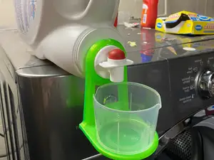 Detergent cup hanger