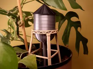 Rootower – A Water Tower Self-Watering Plant Care