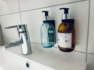 Minimalistic wall mount for soap dispenser