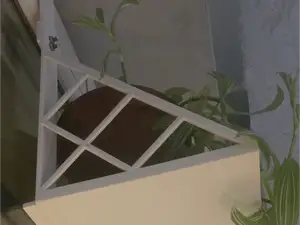 Hanging a flower pot on a window