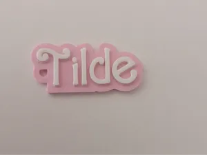 Tilde