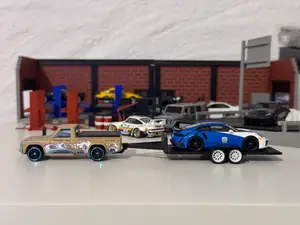 1/64 Scale Mazda REPU with Tow