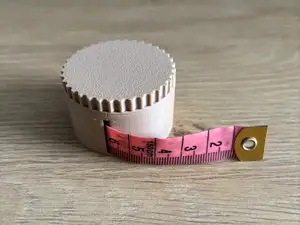 Packaging for a tailor's measuring tape