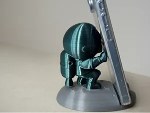 Space astronaut phone stand