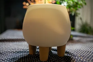Pot with wooden legs
