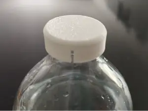 Cap for saline solution bottle