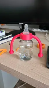 Baby bottle cap with handles