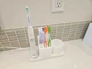 ELECTRIC TOOTH BRUSH HOLDER