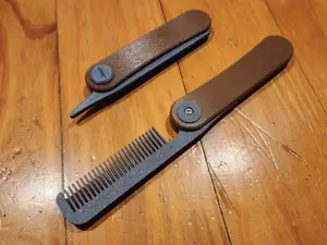 FOLDING COMB