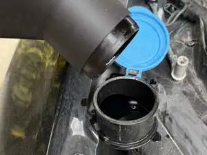 BMW 320i 2024 G20 wiper fluid funnel