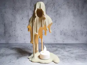 Ghostly Melt – The Spooky Candle Holder