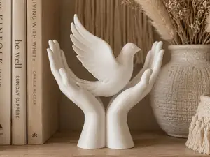 Hands of Peace – Dove in Caring Hands