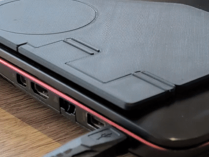 Portable phone holder for laptop monitor