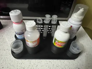 Quad Bottle & Syringe Station