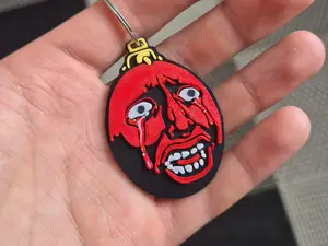 Behelit keychain from Berserk