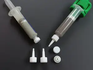 Solder paste plug and nozzles (syringe plug)