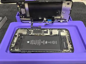 phone repair stand with tool and screw tray