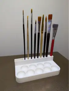 Paint palette with paintbrush organizer