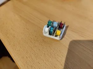 Gridfinity bobbin holder for sewing threads with magnet holes