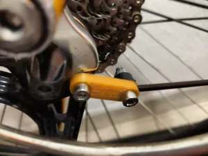 Customizable bicycle mudguard mount extender