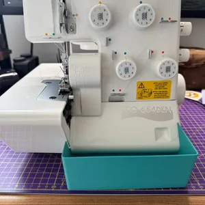 Juki MO 654-den scrap catcher