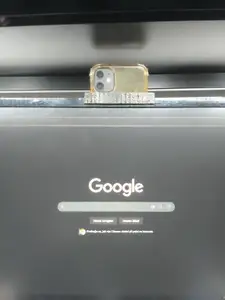 Monitor phone holder for webcam