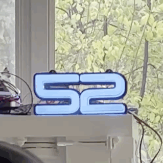 52 Number Sign, in a custom symmetrical font.