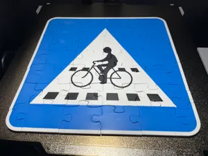 traffic sign puzzle of crossing for cyclist