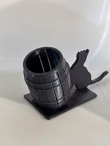 Cat pushing barrel q tip /pen holder