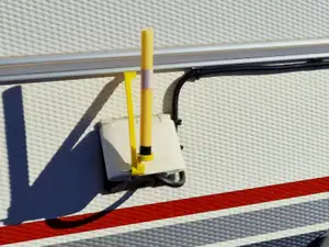 Snow stick holder for Cabby caravan rails