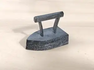 Vintage toy iron