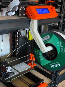 Spool holder for free-standing metal shelves