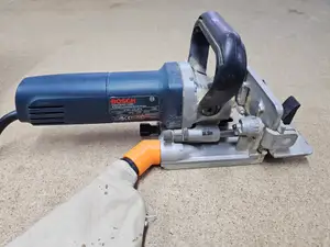 Sawdust bag connector for the Bosh GFF 22 A milling machine