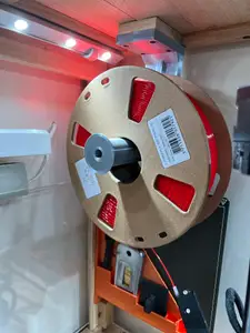 Filament holder for below shelf, rooftop or alike