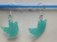 boucle d' oreille twitter