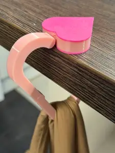 Heart-shaped bag hanger