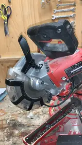 Einhell miter saw 2131 self lock button