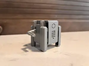 J-1.0: print in place transforming cube robot with cannons