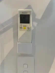 Air conditioner heat pump remote control wall mount holder