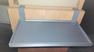 Small hanging shelf for a modem/router