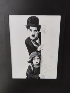 Charlie Chaplin in the movie The kid - hueforge