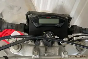Koso EX-02 universal speedometer mount for a Yamaha TW200 Trailway