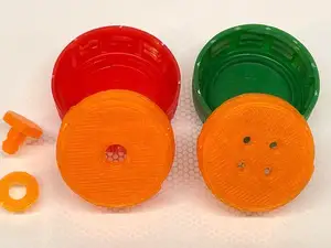 Button for soda bottle caps