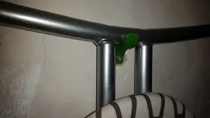 Ironing board holder