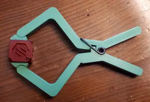Spring clamp with a clothespin spring