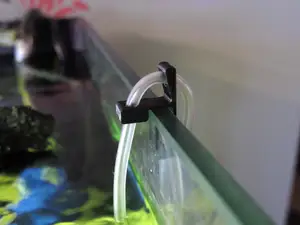 Holder for attaching the 6mm hose to the aquarium glass.