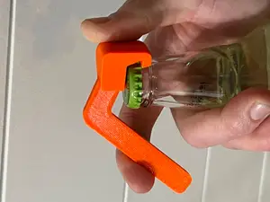One handed bottle cap opener