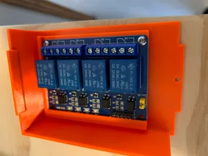 PrusaBox Enclosure 4 Way Relay Holder in Cover Lid Modified to be held with two screws