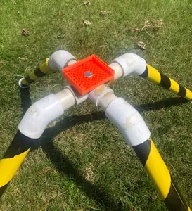 Adjustable Launch Angle Mounting Head with sliding "shoe" attached to Model Rocket Launch Pad